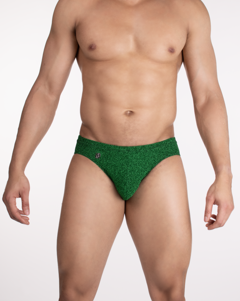 Men’s green glitter swim brief front view – shiny, low-rise cut, athletic fit